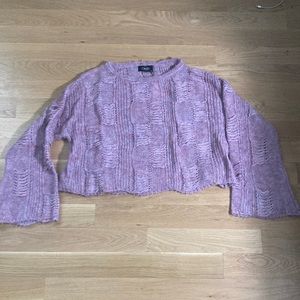 purple knitted sweater